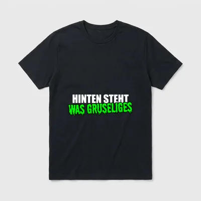 Hinten steht was gruseliges T-Shirt – Schriftzug Hinten steht was gruseliges, grün tropfend – Klassisches T-Shirt in Schwarz