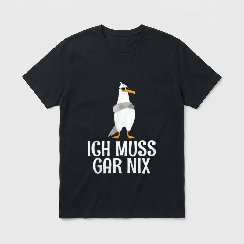 Ich Muss Gar Nix Faule T-Shirt – Möwe mit Sonnenbrille, Schriftzug „Ich Muss Gar Nix“ – Klassisches T-Shirt in Schwarz