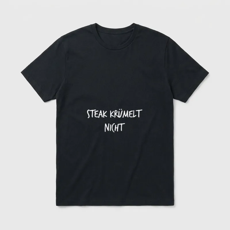Steak krümelt nicht Lustiger T-Shirt – Schriftzug „Steak krümelt nicht“ in Weiß auf Grau – Klassisches T-Shirt in Schwarz
